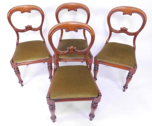 A set of four Victorian mahogany balloon back single dining chairs