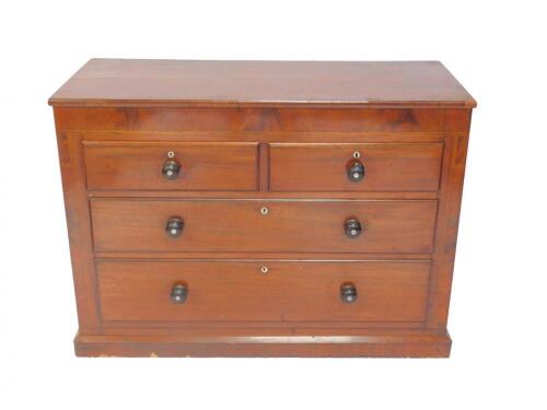 A Victorian mahogany and line inlaid chest of drawers
