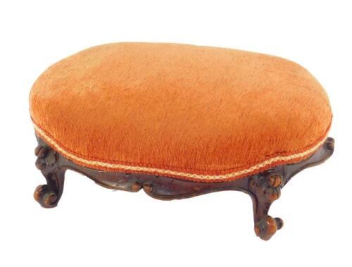 A Victorian oval mahogany footstool