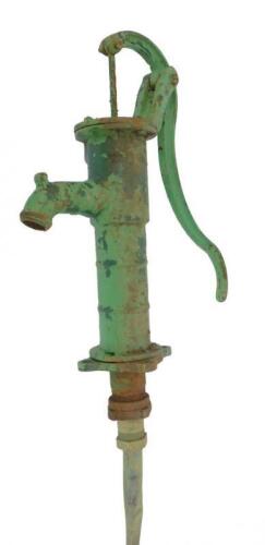 A green painted cast iron water pump