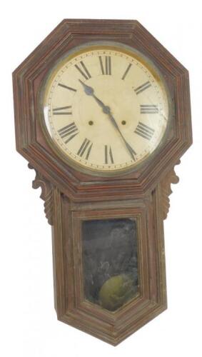 An Ansonia Clock Company octagonal oak cased drop dial wall clock