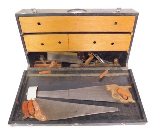 A black painted wooden tool chest
