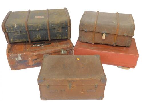 Three canvas travel trunks