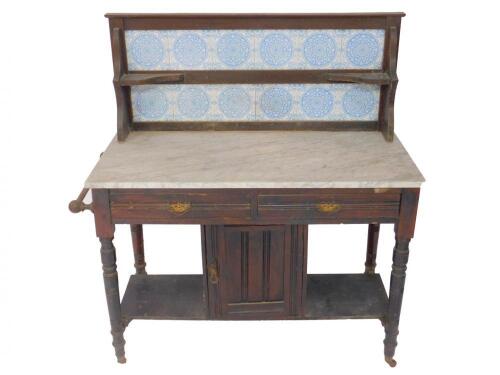 A Victorian stained pine and marbled topped washstand