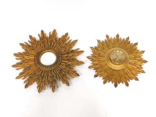 A gilt plaster sunburst wall mirror