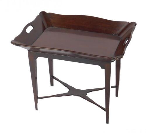 An Edwardian mahogany tray top butler's table