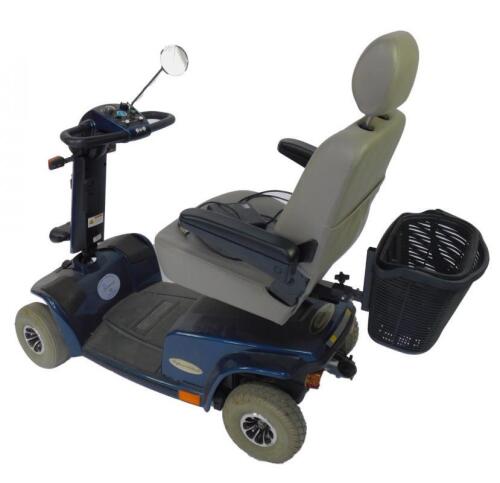 An Electromotion blue mobility scooter.