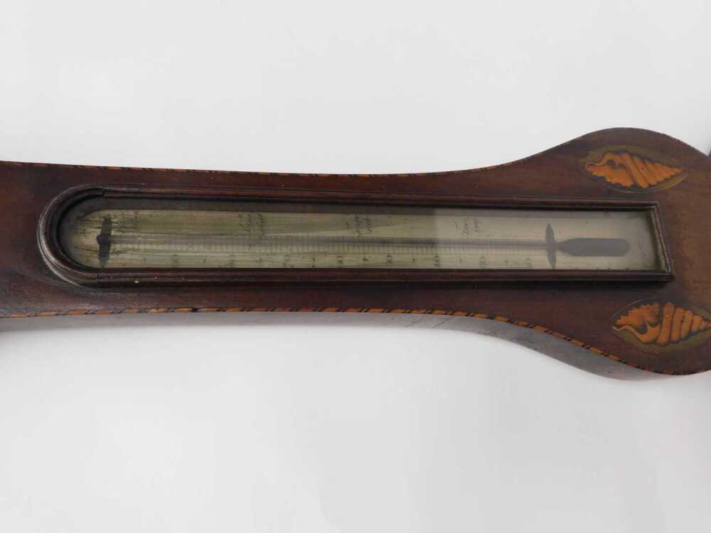 Young Barometer A George III mahogany and inlaid wheel barometer, by John Fiora of ...