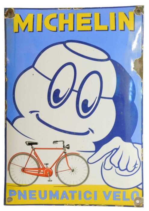 A MICHELIN enamel advertising sign, PNEUMATICI VELO, pale blue and yellow ground, 44cm x 29cm. (AF)