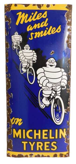 A MICHELIN TYRES enamel advertising sign, Miles and Smiles on MICHELIN TYRES, depicting three...