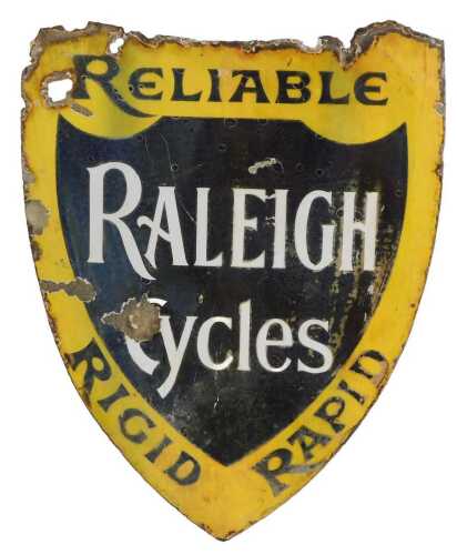 A RALEIGH CYCLES shield enamel advertising sign, RELIABLE RIGID RAPID, yellow and black ground,...