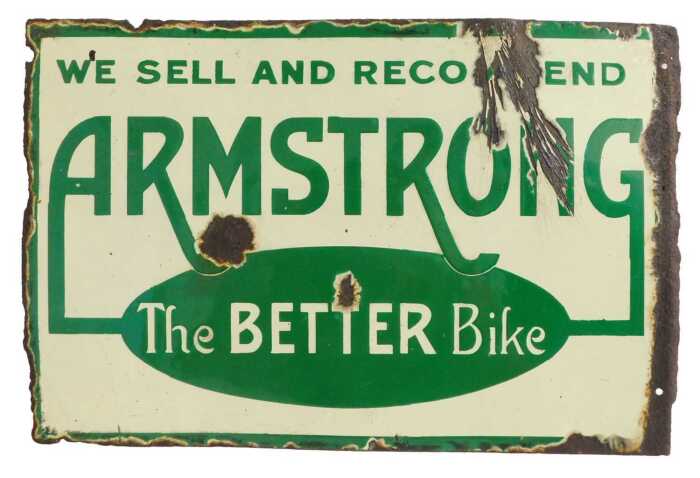 An ARMSTRONG enamel advertising sign, WE SELL AND RECOMMEND ARMSTRONG The BETTER Bike, dark and...