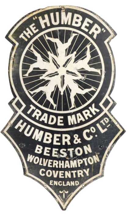 THE 'HUMBER' enamel advertising sign, shaped as a clock face depicting five interlinked figures,...