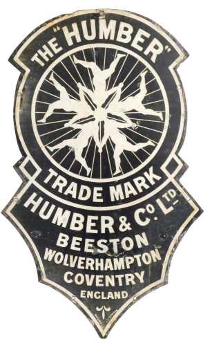 THE 'HUMBER' enamel advertising sign, shaped as a clock face depicting five interlinked figures,...
