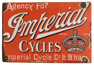 An Imperial CYCLES enamel advertising sign, Agency for, red ground with white lettering, for...