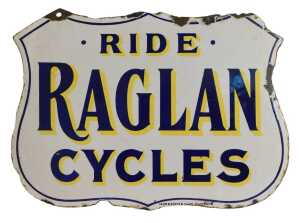 A RAGLAN CYCLES enamel shield advertising sign, RIDE RAGLAN CYCLES, white ground with blue and...