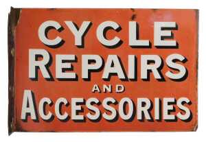 A CYCLE REPAIRS AND ACCESSORIES enamel advertising sign, red ground with white and black...