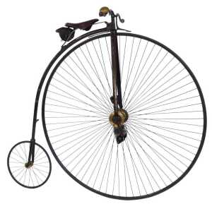 A 19thC penny farthing or ordinary bicycle, the black and red painted frame with a brass bell...