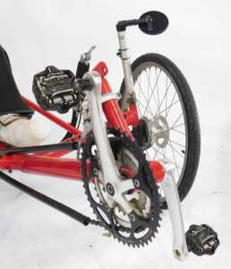 A Greenspeed recumbent tricycle, with a red frame, with Greenspeed labelling, having an Optima... - 4
