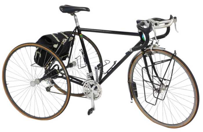 A Reynolds tricycle, the black frame model number 531, with Trans X components secondary bars,...