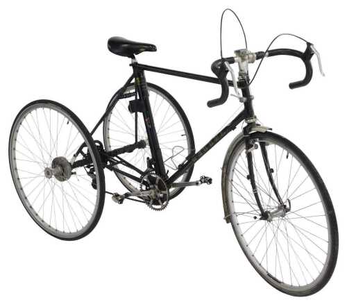 A Reynolds model 531 tricycle, the black painted frame with later racing type handlebars and...