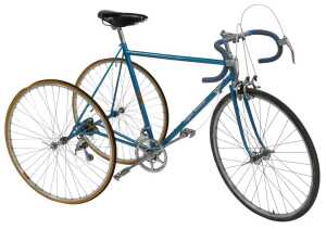A Higgins Ultralite tricycle, the turquoise frame with crest, having GB chrome handles and Super...