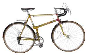 A Velos Tour de France bicycle, with a metallic yellow Reynolds 531 frame, Titan handlebars, ALP...