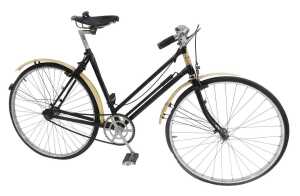 A 20thC lady's bicycle, the painted black frame with chrome handlebars, a Brooks leather seat,...