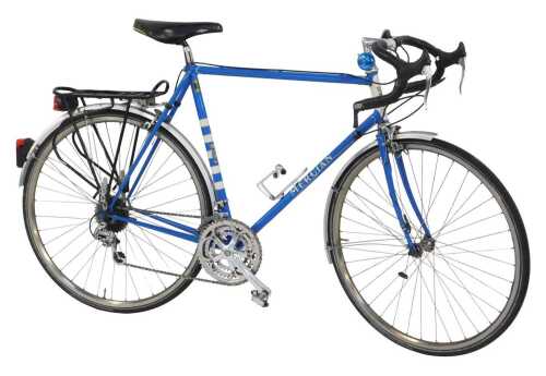 A Mercian Cycles bicycle, the blue and white painted Reynolds 531 frame with applied crests and...