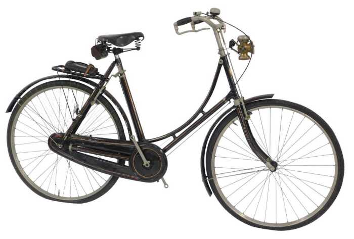 A BSA lady's bicycle, the black frame with gold and red painted line decoration, mounted with a...