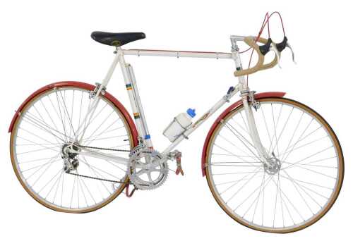 A WH Beattie Lancier bicycle, with a Reynolds 531 cream frame with multicoloured banding,...