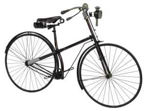 A late 19thC bicycle, the later black, gold and red painted frame with turned wooden capped...