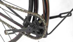 A late 19thC bicycle, the later black, gold and red painted frame with turned wooden capped... - 6