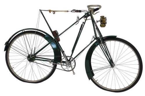 A late 19thC Dursley Peterson bicycle, the green painted frame with a cream woven and sprung...