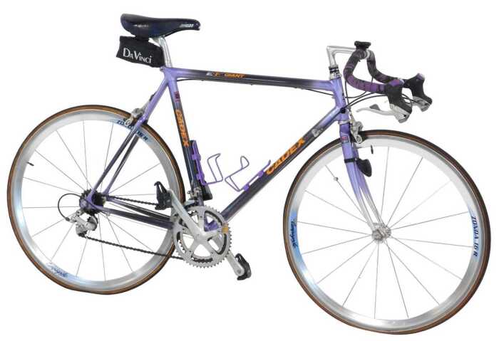 A Cadex Giant bicycle, the purple and black frame Cat Eye CCCL200 Zonda 16R Mavic frame, with...