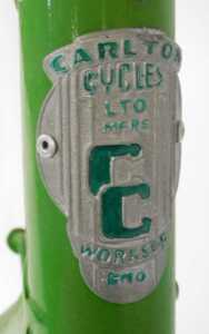 A Carlton Cycles bicycle, the lime green frame with crest and advertising, with bound handlebars,... - 7