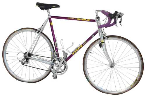 A Vitus Ovoid 222 bicycle, the purple frame with bound handlebars and Shimano 105 brakes, with...
