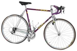 A Vitus Ovoid 222 bicycle, the purple frame with bound handlebars and Shimano 105 brakes, with...