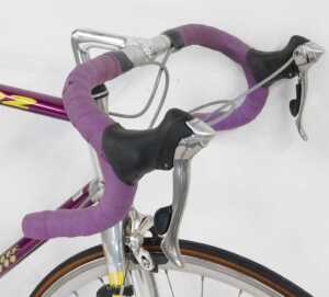 A Vitus Ovoid 222 bicycle, the purple frame with bound handlebars and Shimano 105 brakes, with... - 3