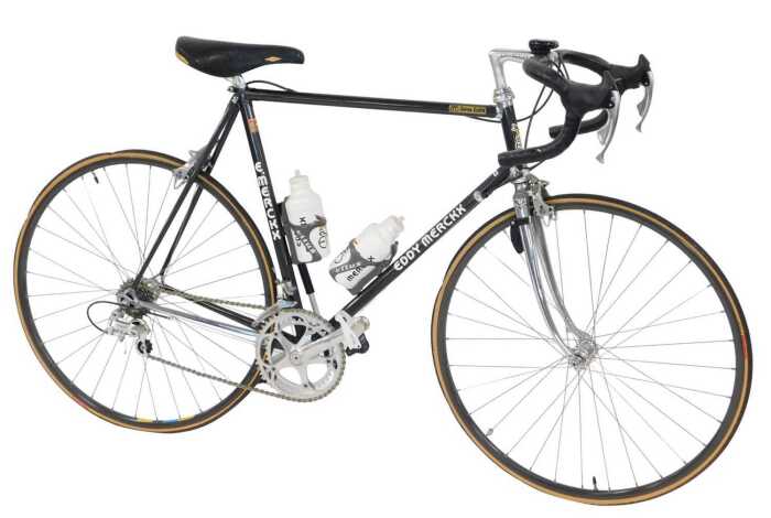 An Eddy Merckx bicycle, the Columbus TSX Corsa Extra frame with advertising and water bottles,...