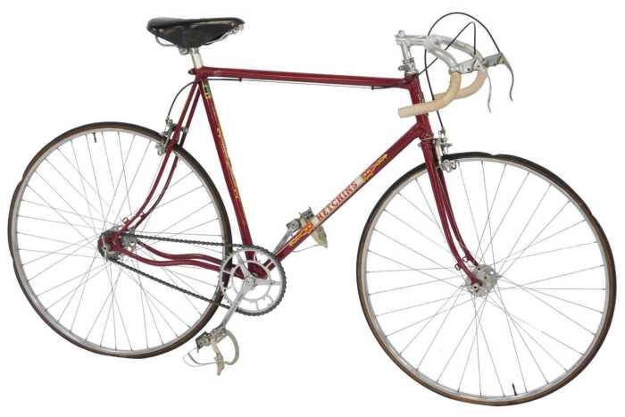 A Hetchins racing bicycle, with a Reynolds 531 red frame with crest, chrome handlebars and...