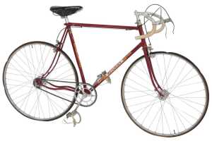 A Hetchins racing bicycle, with a Reynolds 531 red frame with crest, chrome handlebars and...