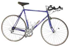 A Giant Peloton Super Light bicycle, the purple Giant Cro-moly frame with three TTT chrome...