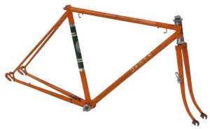 A Dawes Star Celeste bicycle frame and fork set, with polished ornate head set lugs, orange,...
