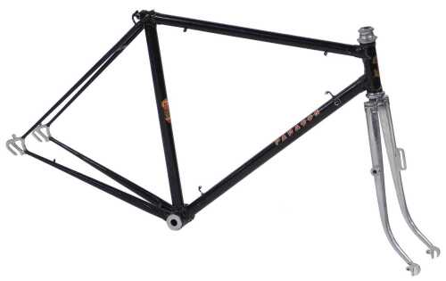 An Andy Bone Paragon bicycle frame and fork set, with intricate lugs, black with chromed fork...