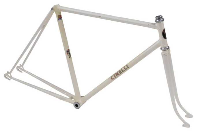 A Cinelli bicycle frame and fork set, with enamelled head badge, white with applied decals.