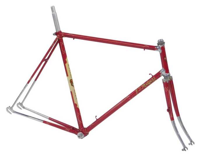 A Tidesley Planet Puma Bicycle frame and fork set, red with ornate polished lugs and fork crown,...