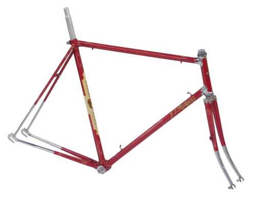A Tidesley Planet Puma Bicycle frame and fork set, red with ornate polished lugs and fork crown,...