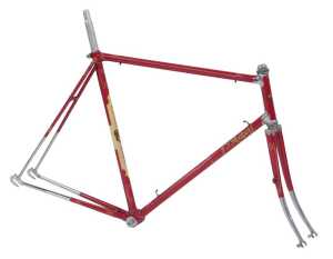 A Tidesley Planet Puma Bicycle frame and fork set, red with ornate polished lugs and fork crown,...