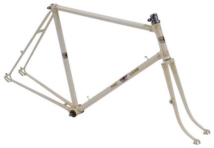 A Maclean Featherweight bicycle frame and fork set, with hand cut lugs, cream with red detailing...